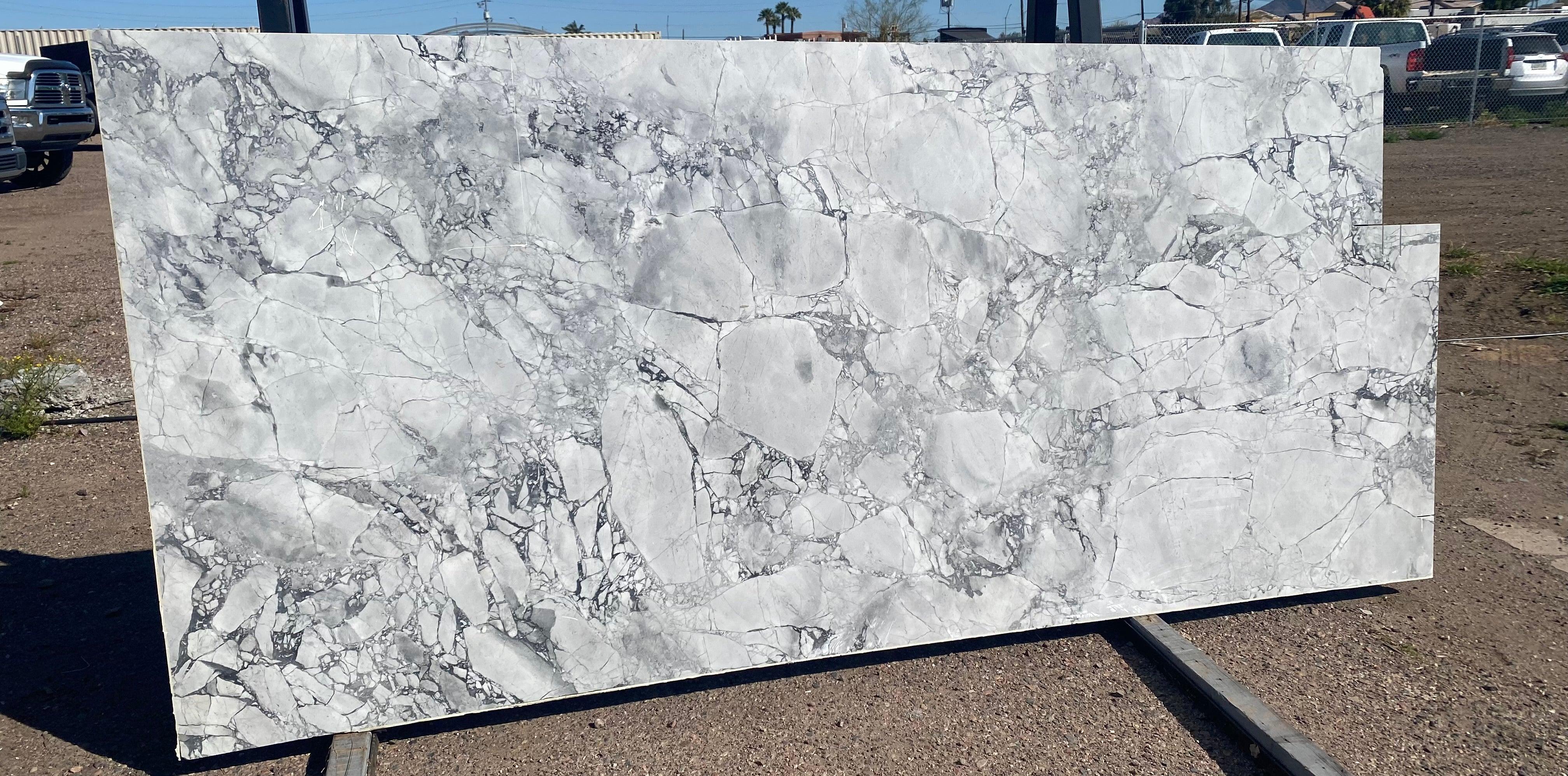 http://granitekarmaoutlet.com/cdn/shop/products/calacatta-bianco-marble-remnant-call-first-for-availability-granite-karma-store-1.jpg?v=1703722243